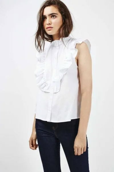 White Sleeveless Ruffle Front Shirt with Black Skinny Jeans