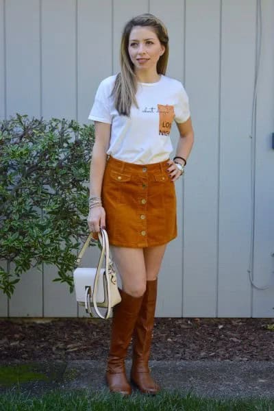 White Print Tee with Green Corduroy Skirt & Brown Boots