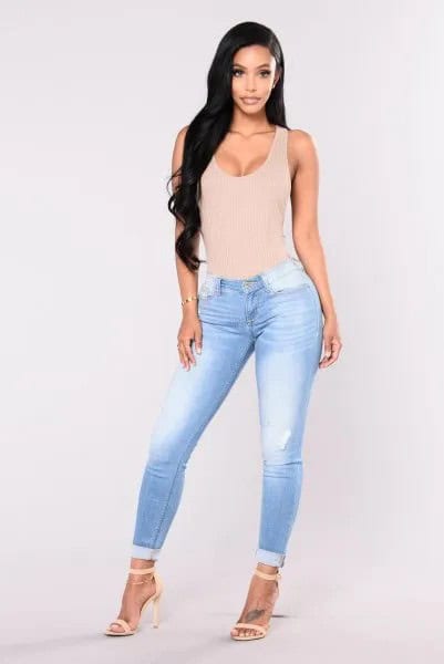 Pale Pink Low Cut Form Fitting Tank Top with Sky Blue Low Rise Skinny Jeans