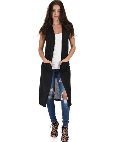 Black Longline Sweater Vest with White Tank Top & Ripped Jeans