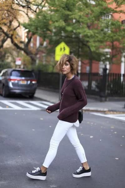 Black Sweater with White Skinny Jeans & Sneakers