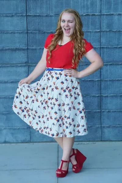 Orange T Shirt with White Floral Flared Skirt & Blue Belt