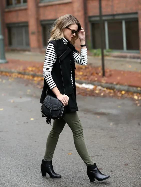 Black Sweater Vest & Green Skinny Jeans