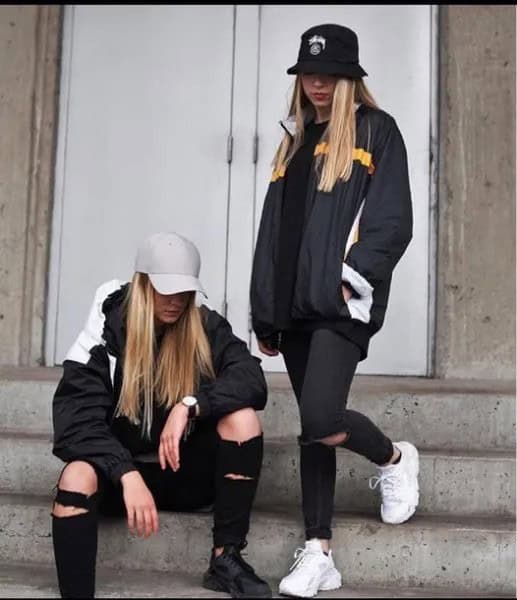 Black Bucket Hat with Wind Breaker & Ripped Jeans