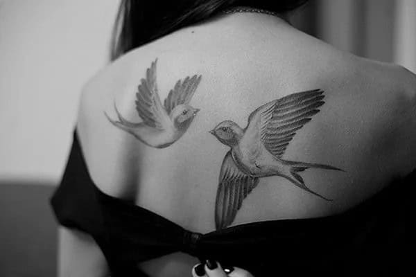 Flying Dove Tattoo on Upper Back