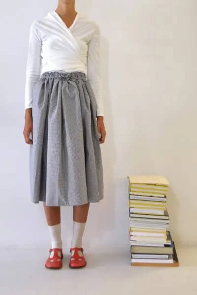 White Wrap Cardigan with Grey Pleated Midi Skirt