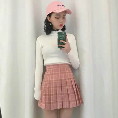 White Mock Neck Sweater with Pink High Waisted Pleated Mini Skirt