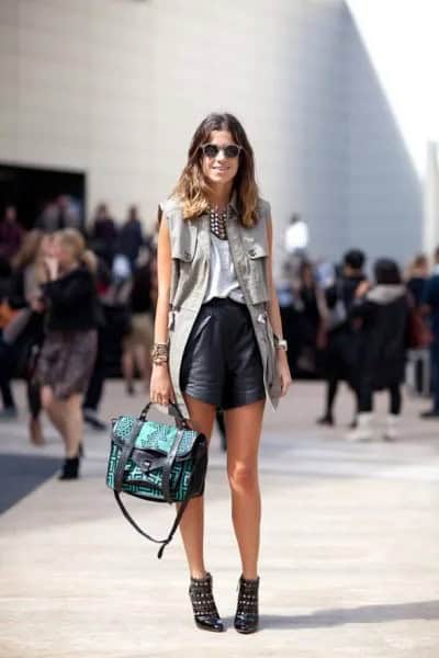 Grey Sleeveless Military Jacket with Black Leather Shorts