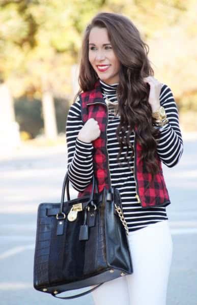 Red and Black Plaid Full Zip Vest Over Black and White Striped Mock Neck Top