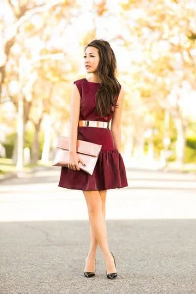 Black Belted Mini Skater Dress with Rose Gold Metallic Clutch Bag