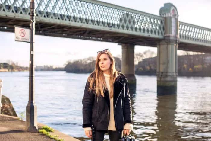 Ivory Crew Neck Sweater with Black Jacket & Skinny Jeans