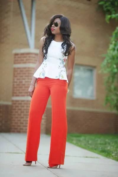 White Floral Embroidered Sleeveless Peplum Blouse with Red Wide Leg Pants