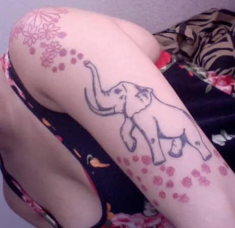 Feminine Elephant Tattoo with Flowers