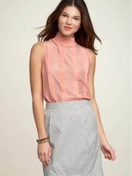 Mock Neck Sleeveless Blouse with Black and White Striped Pencil Skirt