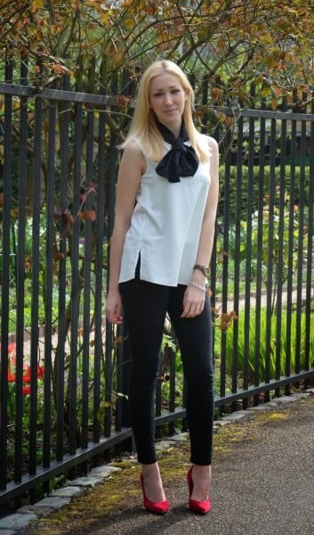 White Sleeveless Bow Blouse with Black Skinny Jeans