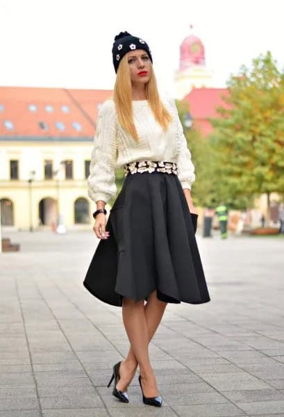 White Chunky Knit Sweater with Black Pleated Skirt & Heels