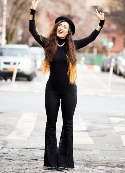 Black Form Fitting Sweater with Matching Flared Jeans