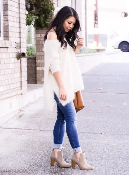 White One Shoulder Knit Sweater with Blue Cuffed Jeans