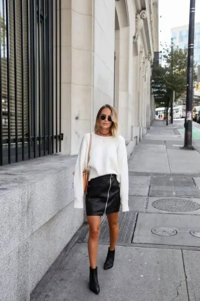 White Oversized Knit Sweater with Black Mini Leather Zipper Skirt