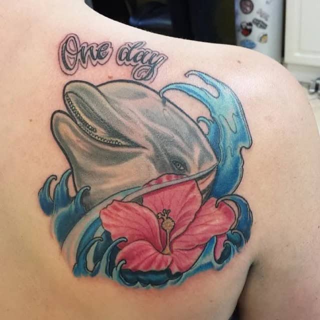 Dolphin And Hawaiian Flower Tattoo