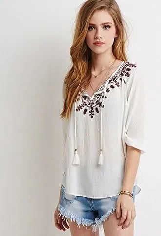 White Peasant Top with Tassel Details with Blue Fringe Mini Denim Shorts