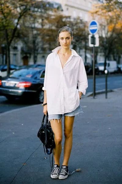 White Oversized Shirt with Light Blue Ripped Denim Shorts