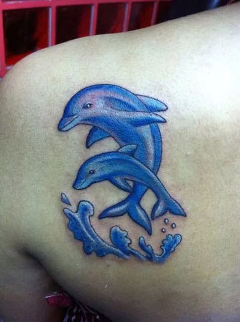 Dolphin Tattoo on Back of Shoulder