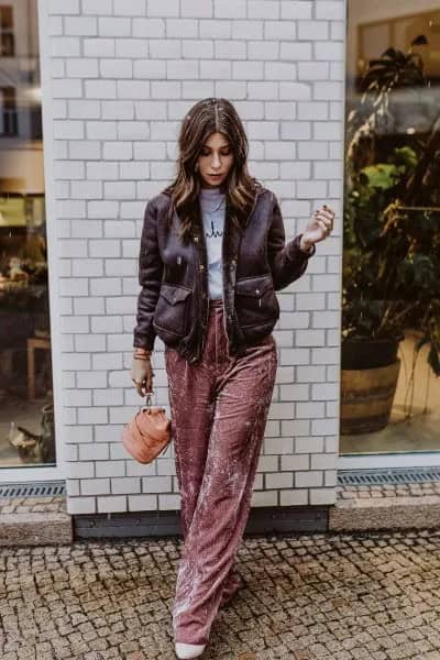 Black Leather Jacket with Grey Print Tee & Pink Wide Leg Velvet Pants